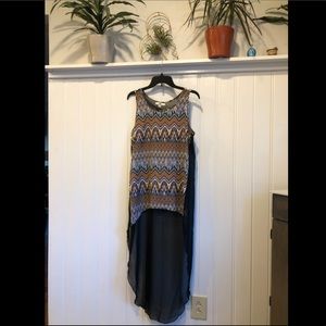 Sheer top with a long back